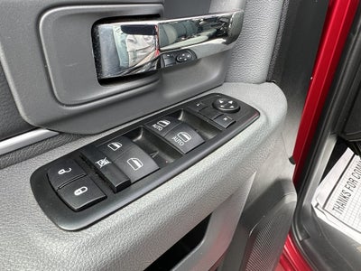 2015 RAM 1500 4WD Quad Cab 140.5" SLT